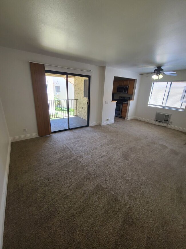 Building Photo - Spacious 2Bd Condo in Mira Mesa with Private Balcony & In-Unit Laundry!