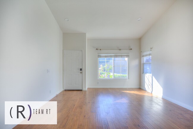 Building Photo - A Captivating and Charming 2 Story Home Ne...