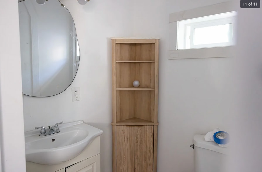 brand new cabinet and real brass light fixture - 1359 Oakwood Dr