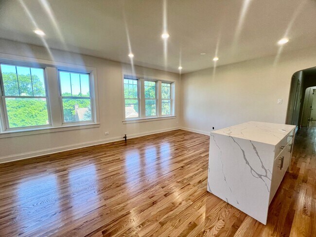 Building Photo - Brand New Renovation! 3 BR/ 2 BA On Quiet ...