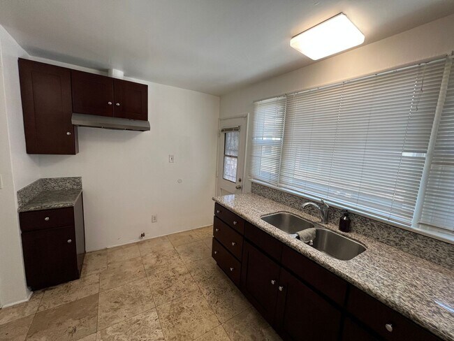 Building Photo - 51st Street Apartments Triplex