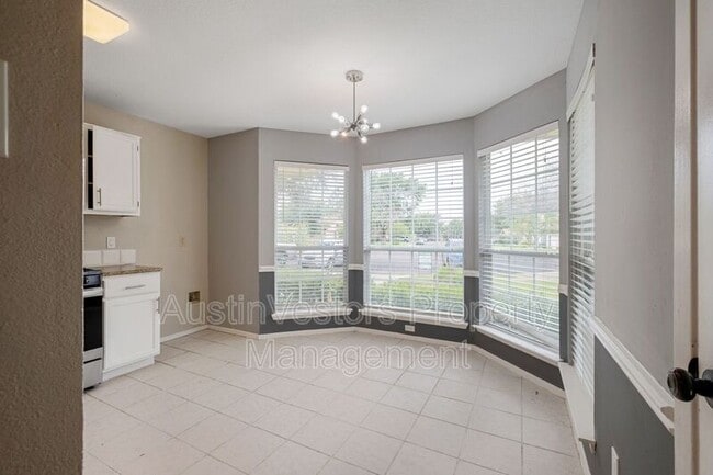 Building Photo - 8900 Pocono Cove