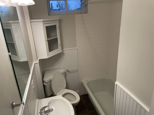 New subway tile in the shower/ tub - 5033 Devonshire Ave