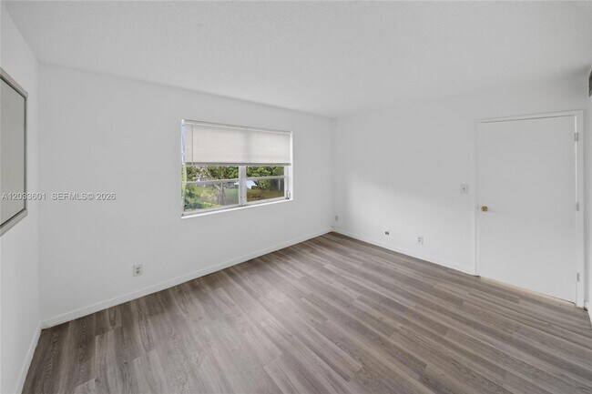 Building Photo - 8750 N Sherman Cir