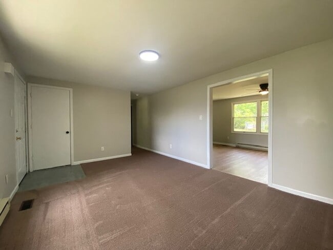 Building Photo - Welcome to this charming three bedroom, on...