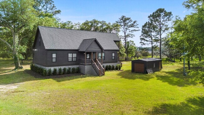 Building Photo - "Spacious 4-Bed Oasis with Guest Suite on Johns Island - Your Dream Home Awaits!"