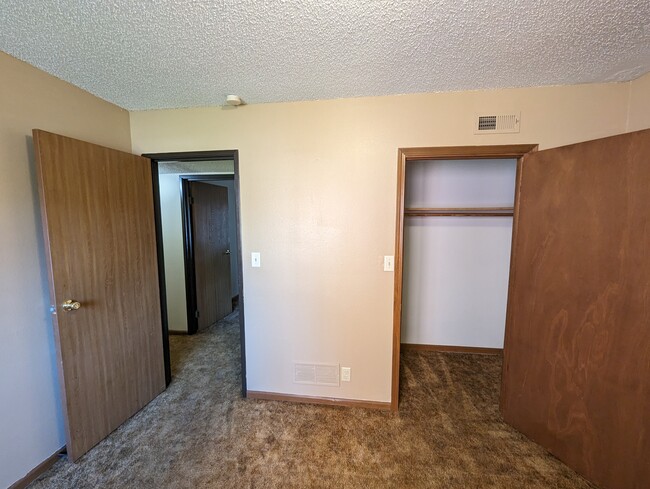 Master bedroom with walk in closet - 4945 Walker Ave