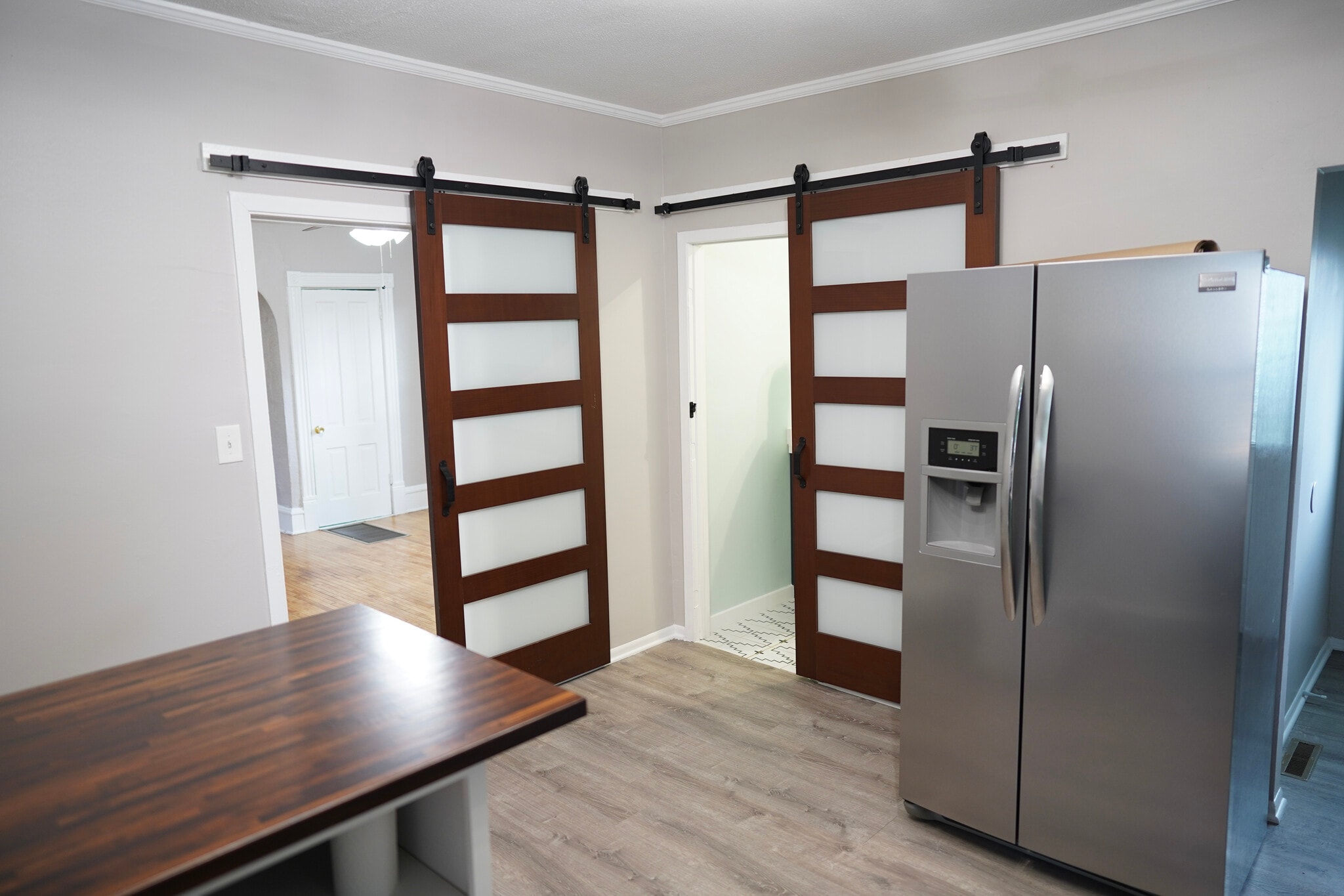 Kitchen door to bthrm & activity/office room - 413 19th Ave NE