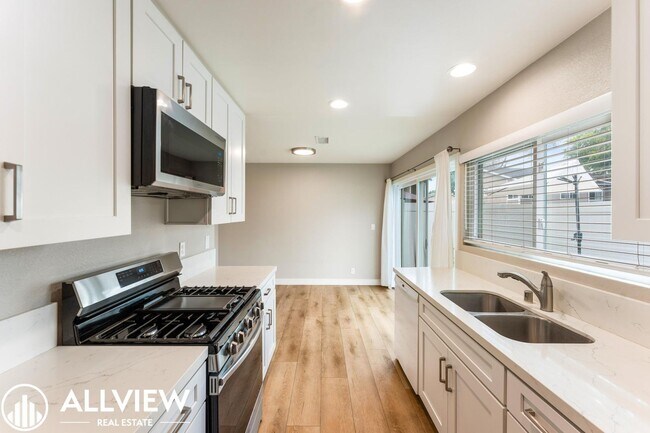 Building Photo - Two-Story Gem in Huntington Beach - Modern Upgrades & Private Outdoor Space