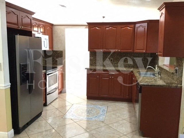 Building Photo - 9703 NW 42nd Ct