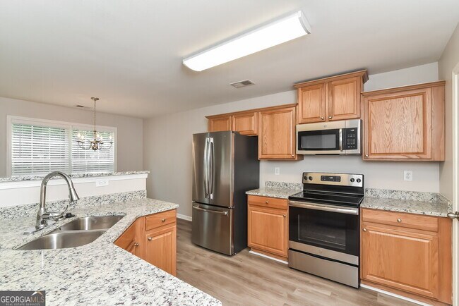 Building Photo - 6695 White Walnut Way