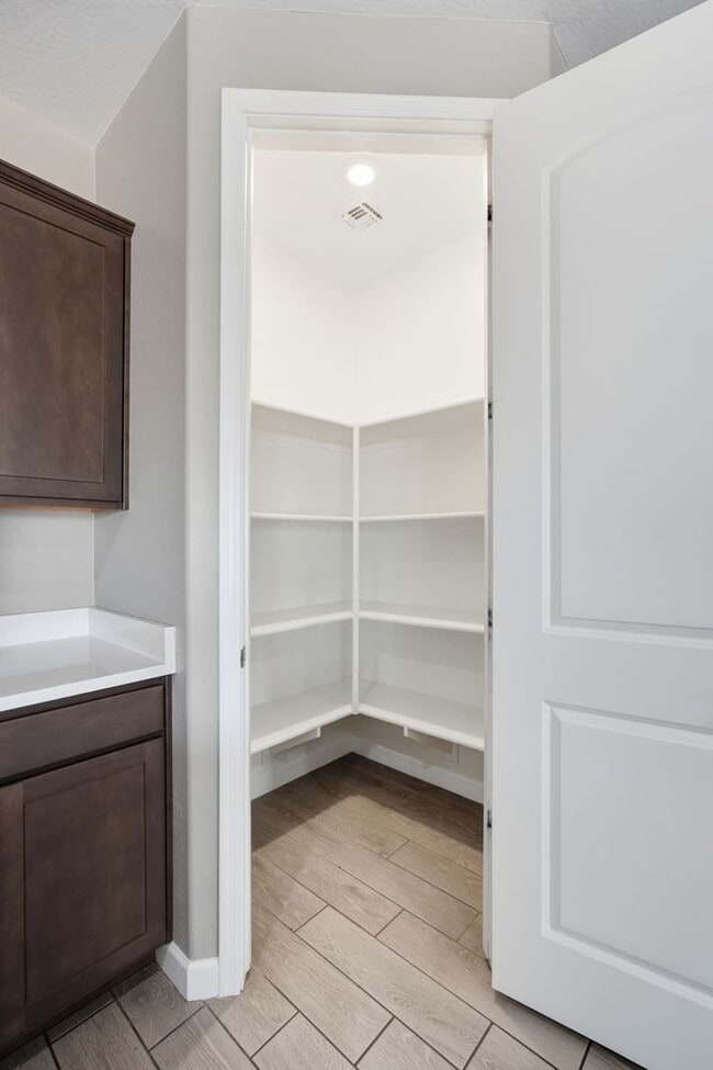 Building Photo - Spacious 5-Bedroom Home with Open Floor Plan & Private Backyard
