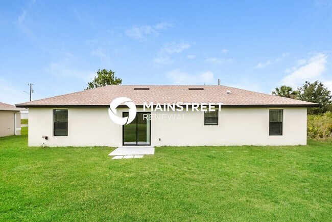 Building Photo - 4 Bedroom Pet-Friendly Home in Lehigh Acre...