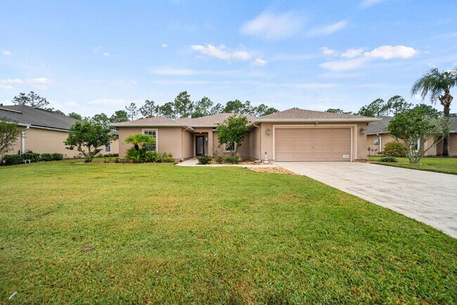 Building Photo - Luxurious Palm Coast Retreat: 4-Bed 3 Bath...