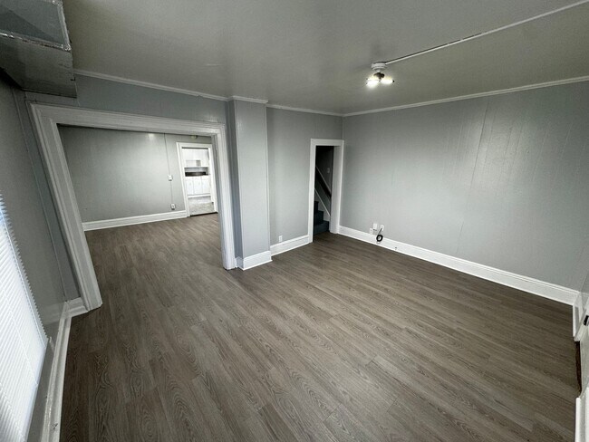Building Photo - Interested in a two-bedroom house that includes a large garage. Please let us know