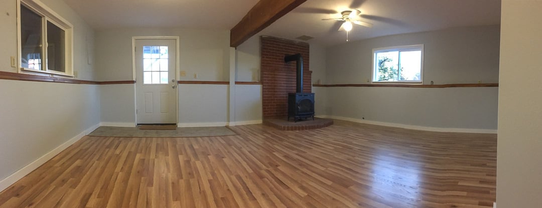 Downstairs family room. New gas stove is super cozy. - 901 Montana St