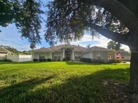 Building Photo - 10934 Versailles Blvd