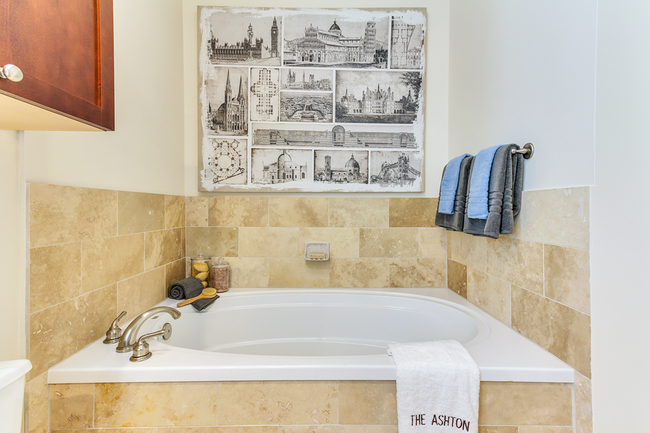 Spa-inspired soaking tub in spacious luxury bathrooms - The Ashton