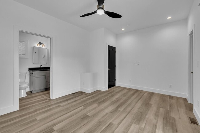Building Photo - Modern New Construction Townhome with Roof...