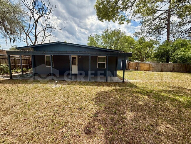 Building Photo - Fully Renovated 2BR Brick Home with Vaulted Ceilings & Backyard Retreat!