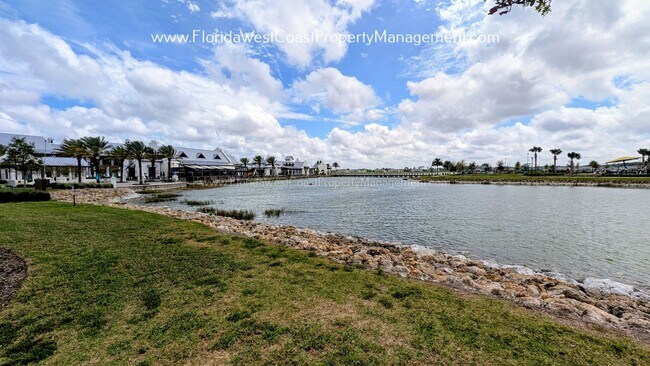 Building Photo - EXCEPTIONAL AND SPACIOUS FURNISHED TOWNHOME WITHIN WATERSIDE- NAUTIQUE!