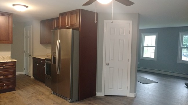 Kitchen open to living room, closet is built in pantry - 37 Porcupine Cir