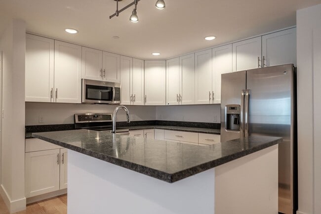 Building Photo - 2BR/2BA Old Port Condo Onsite Parking Available, Fitness Room and Elevator