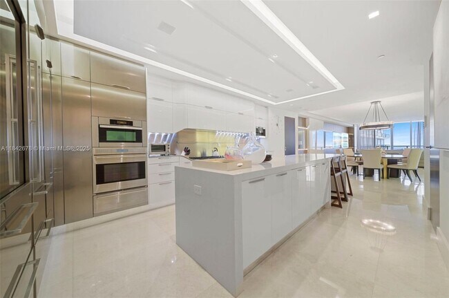 Building Photo - 9701 Collins Ave