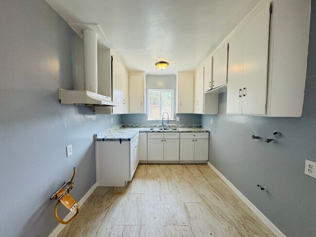 Building Photo - 1230 W 144th St