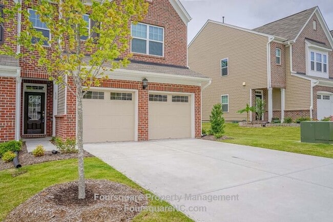 Building Photo - **Coming Soon: July 16, 2026: Charming End-Unit Townhome with Bonus Room, Screened Porch & 2-Car ...