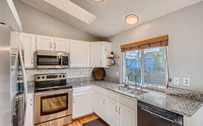 Building Photo - Incredible Tri-level home in Cherry Creek ...