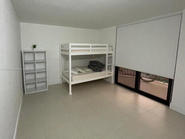 Building Photo - 8877 Collins Ave