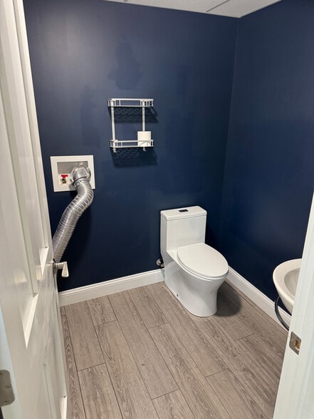 Washer and dryer hook ups in first floor half bath - 251 Main St