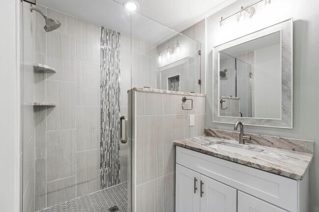 Building Photo - Rare Find: Updated and Modern End-Unit Tow...