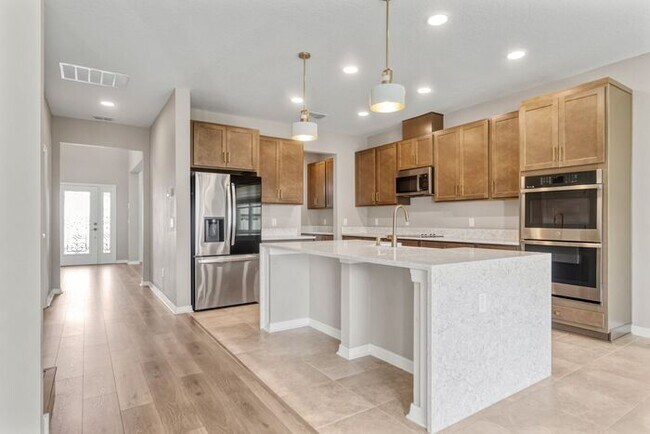 Building Photo - Discover luxury living in the gated Whispe...