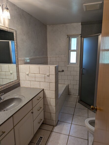 Bathroom, includes tub and standalone shower - E9461 945th Ave