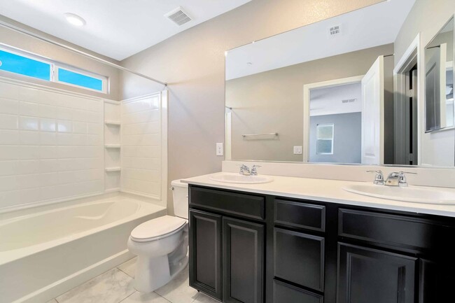 Building Photo - Desirable Southwest Townhome: Luxury Living!