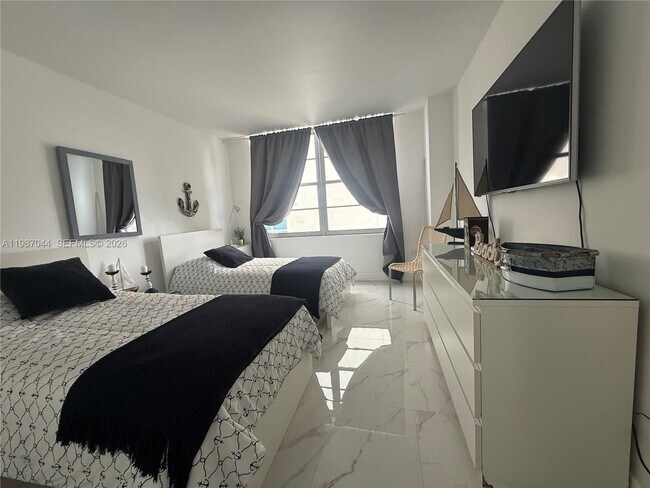 Building Photo - 5555 Collins Ave