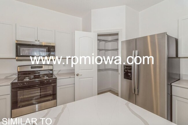 Building Photo - NEW CONSTRUCTION!! 4 Bed, 3 Bath Home in Urbandale