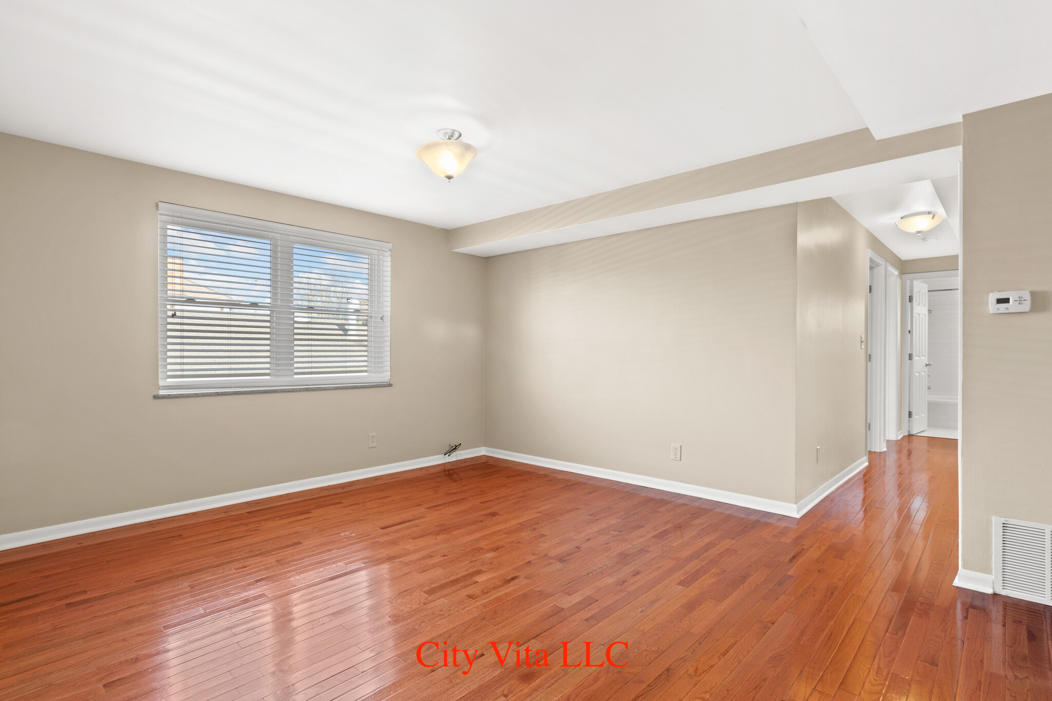 Large living room area with hardwood floors - 69 N 20th St