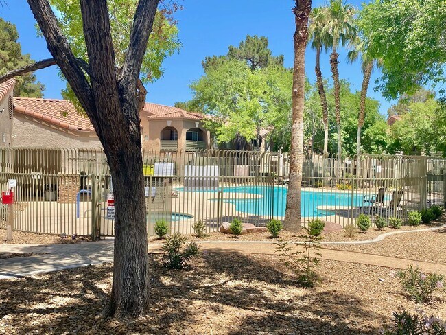 Building Photo - ADORABLE GATED CONDO LOCATED IN A GATED CO...