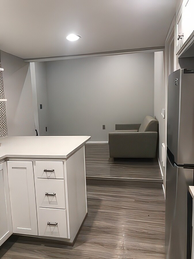 View into Living Room from Kitchen - 831 NE Holland St