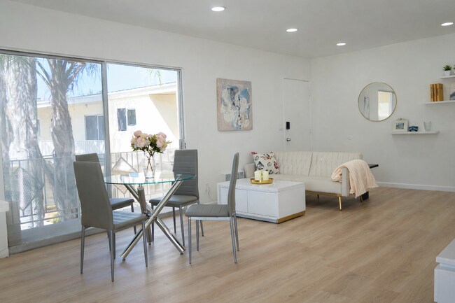 New Hardwood Floors, New Furniture, and New Lighting - 5860 Hazeltine Ave