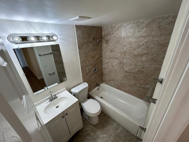 Building Photo - Remodeled 3 Bedroom 2 bath House with Backyard