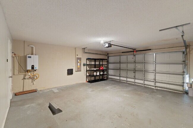 Building Photo - "Spacious 4-Bedroom Gem with 2.5 Baths in ...