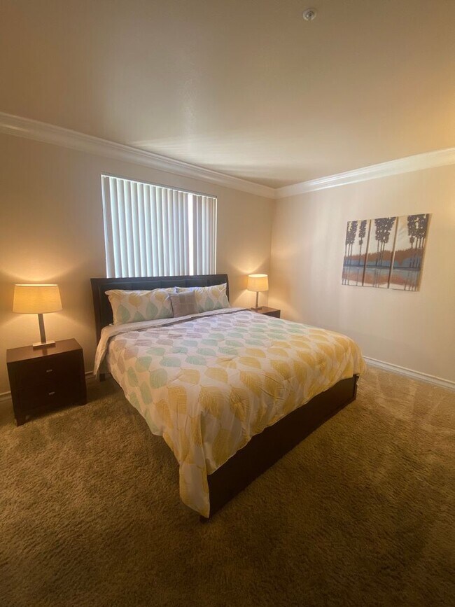 Building Photo - Long or short term available!  Live in lux...