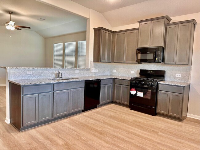 This gorgeous kitchen has plenty of space to prepare a family meal! - 507 Turtle Dove Dr