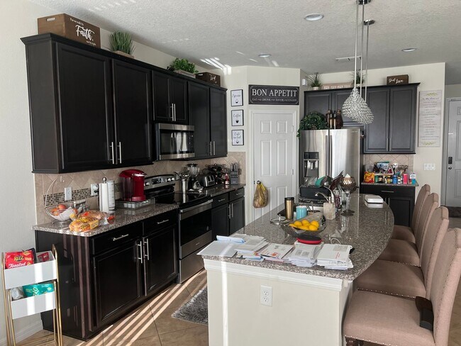 Building Photo - INCREDIBLE DEAL: 5-BR Corner Lot Home in Crown Pointe Cove – Spacious & Bright!