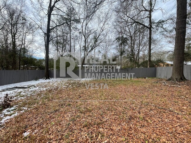 Building Photo - Three Bedroom Home in  Lake Wildwood Gated...