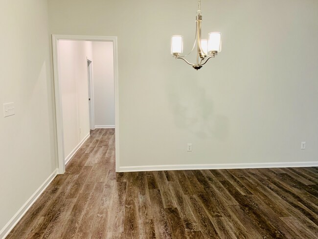 Building Photo - Coming soon!!  "Spacious 3-Bedroom Haven w...